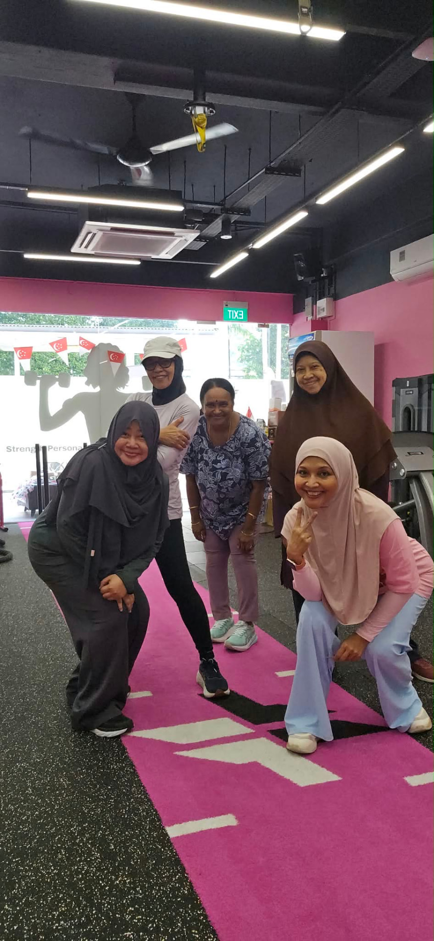 FitFab.sg members smiling together after class